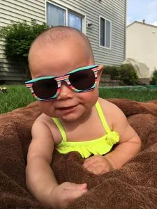 Infant wearing sunglasses