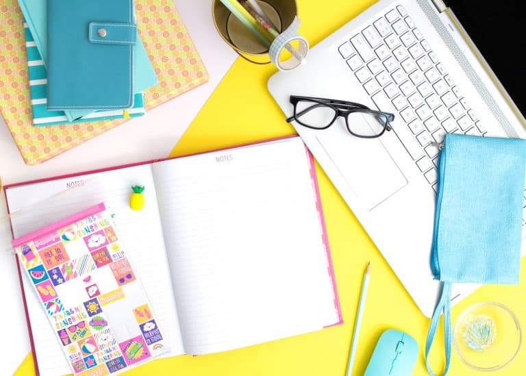 cluttered items on desk