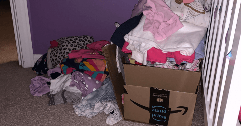 Piles of clothes on the floor