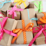 Gifts wrapped in brown paper and colored bows