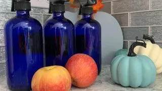 Fall scented blue cleaning spray bottles