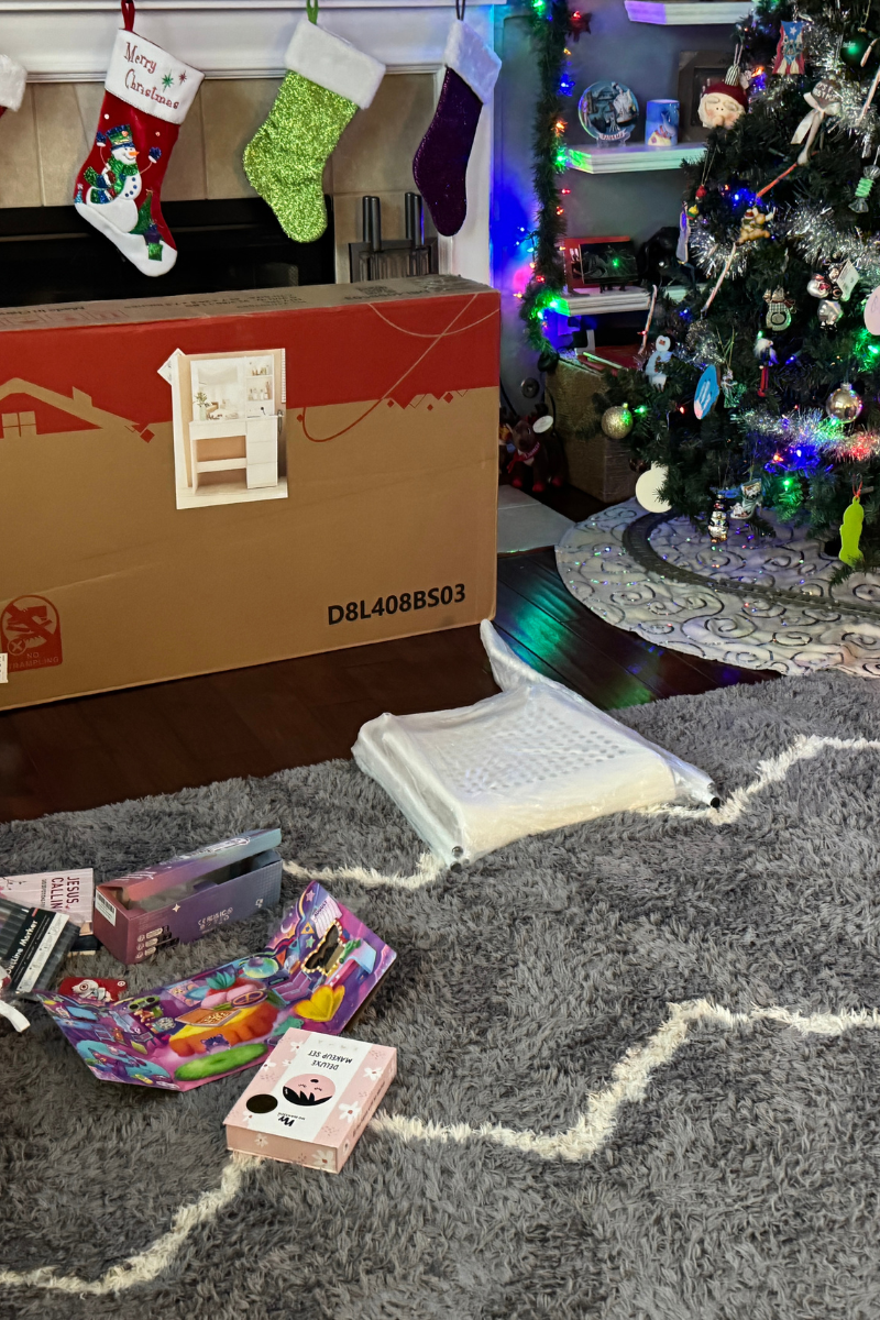 Christmas Tree with opened presents around