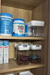 Food organized on pantry shelf