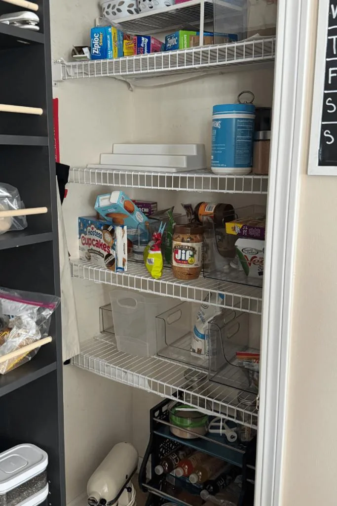 Messy pantry with wire shelves