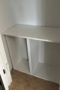 IKEA white base cabinets inside a pantry
