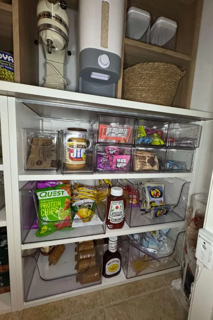 Pantry organized with clear containers