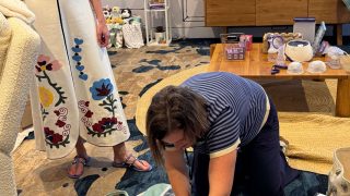 Mom organizing a travel bag
